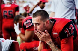 Doughty pauses before taking the field against the Bowling Green State Falcons at Smith Stadium. WKU would go on to win 59-31 with a record-breaking night by Doughty.