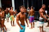 Coffell practices his posing before going out for the men’s physique class-A competition. Coffell also competed in the collegiate and teen physique classes.