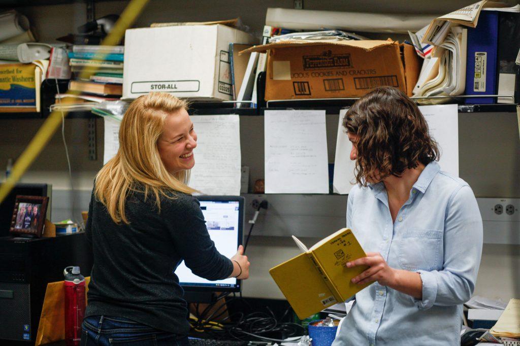 ABOVE Laffoon laughs with classmate Janis LeMaster, a Shelbyville senior, during a lab meeting. The small class met weekly to do research and check their progress with Albert Meier, their professor.