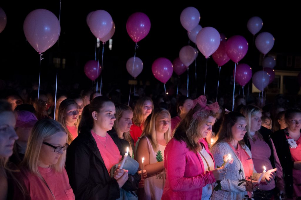 Over 170 mourners gathered in honor of Stephanie Campbell in front of the Alpha Gamma Delta house . Campbell died in a single car accident. (Talisman/Michael Noble Jr.)