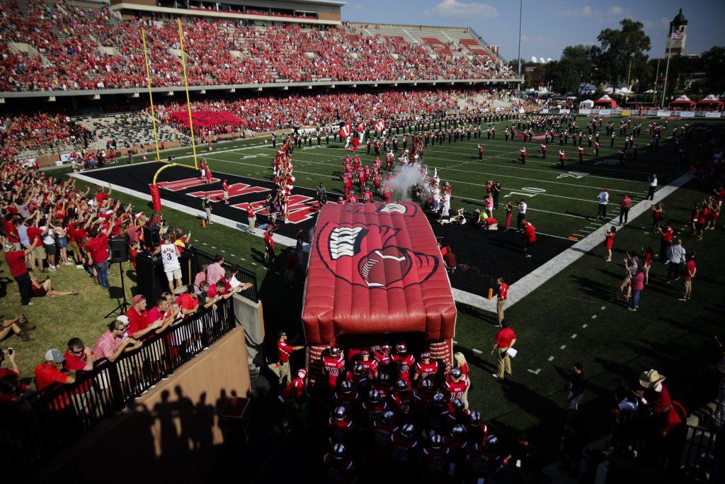 The WKU football team runs through the tunnel onto the field before their game against Vanderbilt on Sept. 24, 2016 at L.T. Smith Stadium.