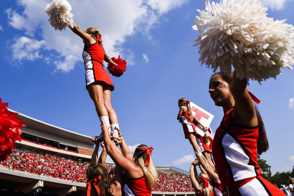Cheerleaders perform in front of a record-setting crowd at LT Houchens Stadium. Over 23,000 fans flocked to WKU for the rivalry matchup against Vanderbilt.