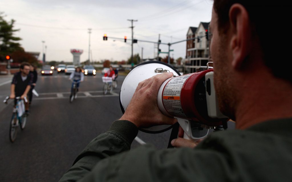 Bowling Green residents participate in a bike parade to encourage the people of Bowling Green Ky, to voice their opinion and vote.