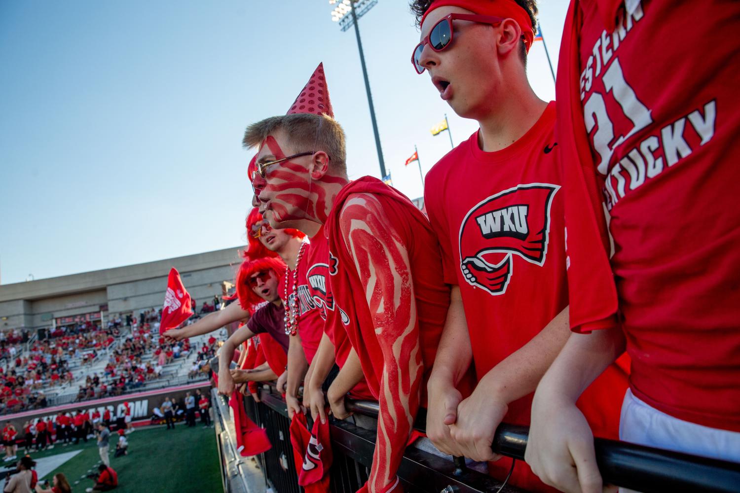 WKU Sophomore, Landon Patton, screams with his friends in the student section during the first game of the season against Sam Houston Bearkats at Houchens-Smith Stadium on Saturday, Aug. 23. (Photo by Kaitlyn Webb)